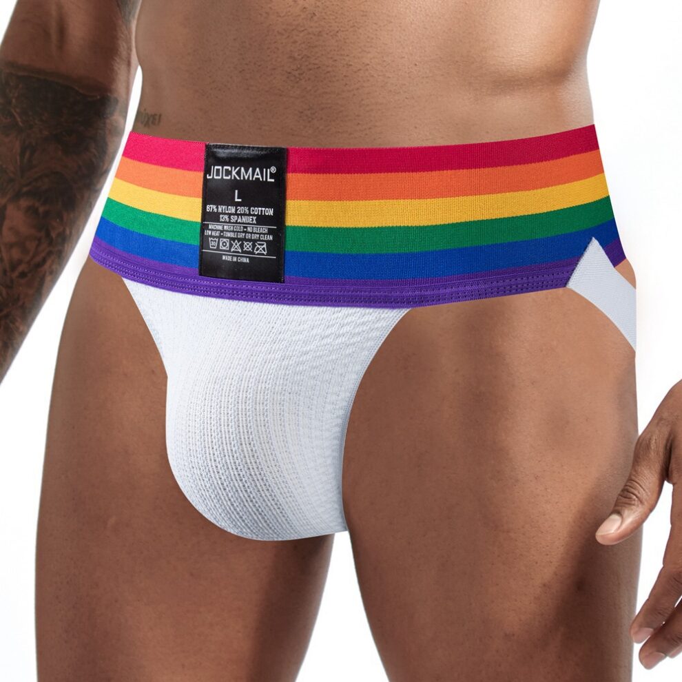 Man modeling a white jockstrap with a rainbow-striped waistband.