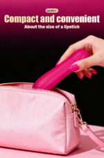 Lipstick-sized pink vibrator being slipped into a pink cosmetic bag, highlighting its compact design.