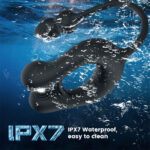 Black waterproof silicone sex toy ring submerged in blue water, highlighting IPX7 waterproof and easy to clean.