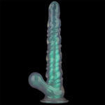 Translucent teal silicone dildo with ribbed shaft and suction base, standing upright against a black background.