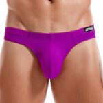 Close-up of a male wearing bright purple men's brief underwear with a black JOCKMAIL label on the waistband.